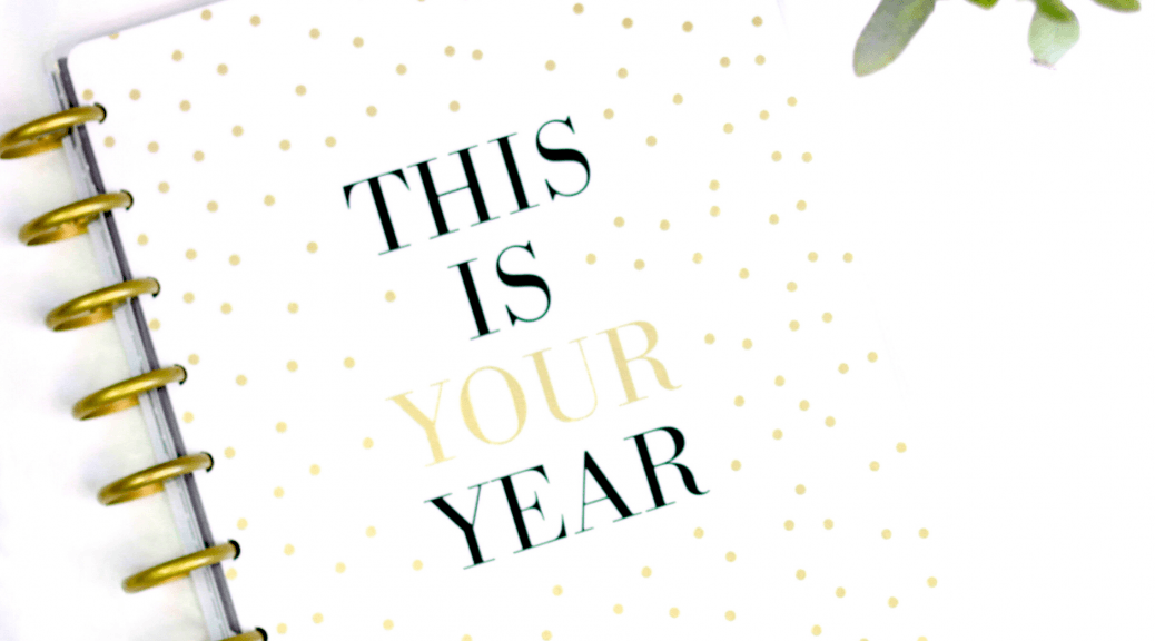 A "This Is Your Year" book, highlighting the article's theme of making resolutions and goals without falling prey to emotional fallacies