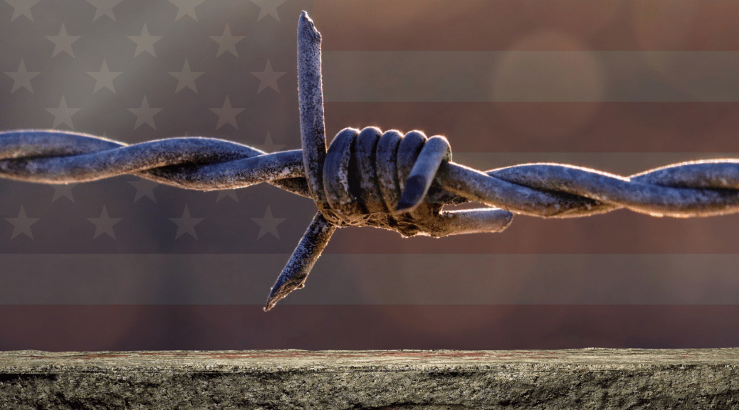 Image of barbed wire in front of a flag to go with an article about the unhealthy rhetoric of the Patriot Movement