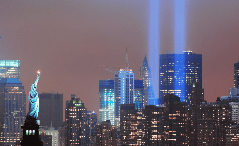 A picture of the 9/11 memorial introducing a piece talking about 9/11 conspiracy rhetoric and the term "new world order"