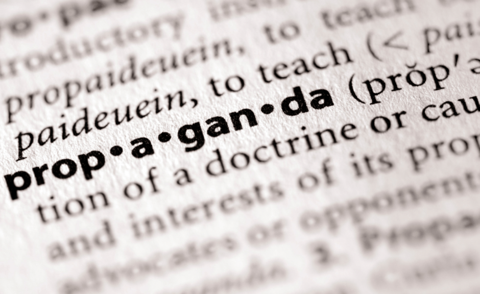 a dictionary definition of propaganda to ground an analysis of right-wing conspiracy rhetoric against the DOJ